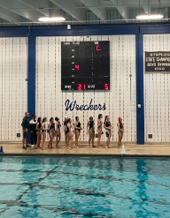 The Staples’ girls water polo team lines up before an impressive victory against Choate. 

