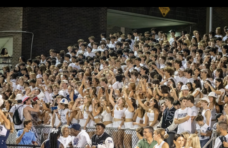 Staples students show their school spirit at a white-out football game on Sep. 9 2023.