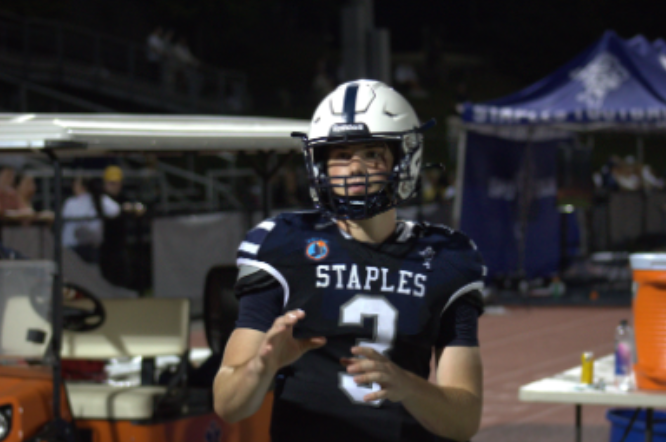 Staples Quarterback Nick Weil threw for 223 yards and 5 touchdowns against Hamden on Friday