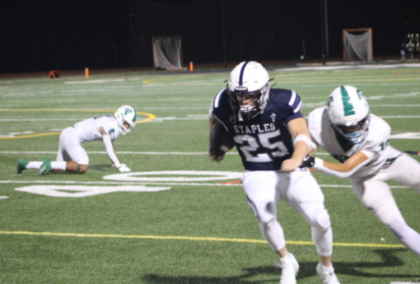 Anthony Armentano ’25 combined with Kody Goldman ’25 for 254 rushing yards. (Photo by Will Enquist '26)